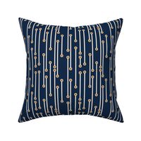 dotted lines in navy, cream and terracotta