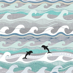 dolphins and waves