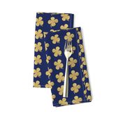 Gold four leaf clover on navy Luck of the irish notre dame fighting irish