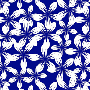 Vivid white florals bloom on a deep blue canvas, offering a classic yet contemporary pattern.