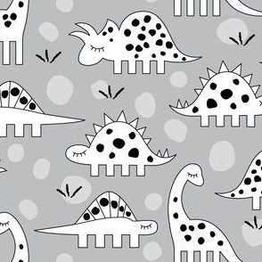 white dinosaurs with black spots on grey