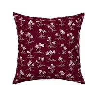 tiny Christmas narcissus on deep burgundy red (5a001c)