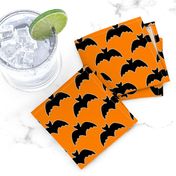 Halloween bats on orange