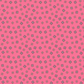 Small ditsy floral on a red pink background
