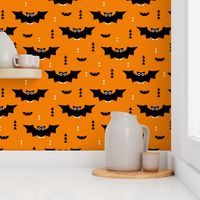Cute little baby bats geometric halloween horror print with triangles orange night