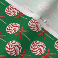 (2" scale) whirly pop - Christmas red and white on green C18BS