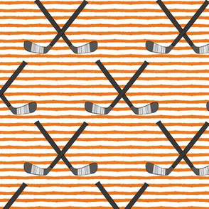 hockey sticks on stripes - orange C18BS