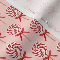 (2" scale) whirly pop - Christmas red and white on rose C18BS