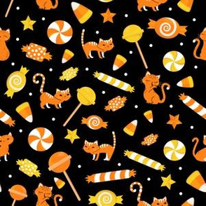 Enchanting Halloween Candy Delights with Orange Kitty Cats
