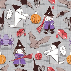 Halloween origami tricks // grey linen texture background white and coloured paper and cardboard geometric witches cats ghosts spiders wolfs bats Dracula lips and pumpkins