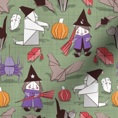 Halloween origami tricks // sage green linen texture background white and coloured paper and cardboard geometric witches cats ghosts spiders wolfs bats Dracula lips and pumpkins