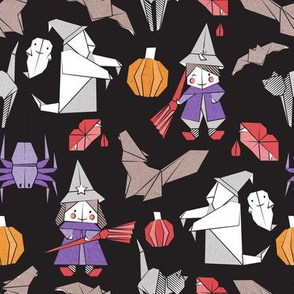 Halloween origami tricks // black background white and coloured paper and cardboard geometric witches cats ghosts spiders wolfs bats Dracula lips and pumpkins