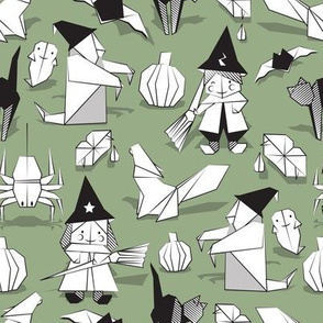 Halloween origami tricks // sage green background black and white paper geometric witches cats ghosts spiders wolfs bats Dracula lips and pumpkins