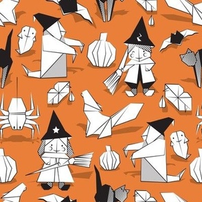 Halloween origami tricks // orange background black and white paper geometric witches cats ghosts spiders wolfs bats Dracula lips and pumpkins