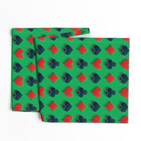 Playing Card Suits on Green Felt Casino