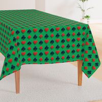 Playing Card Suits on Green Felt Casino