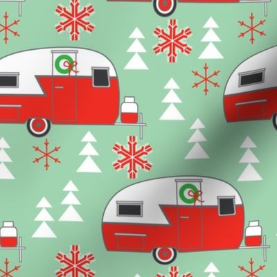large christmas trailers on green
