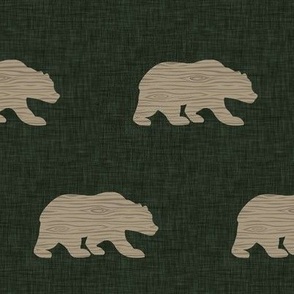 3” wood bear on dark green linen