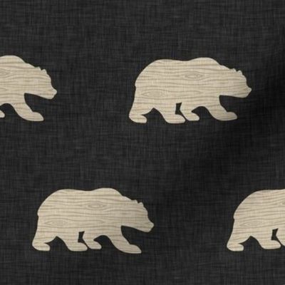 3” wood bear on black linen