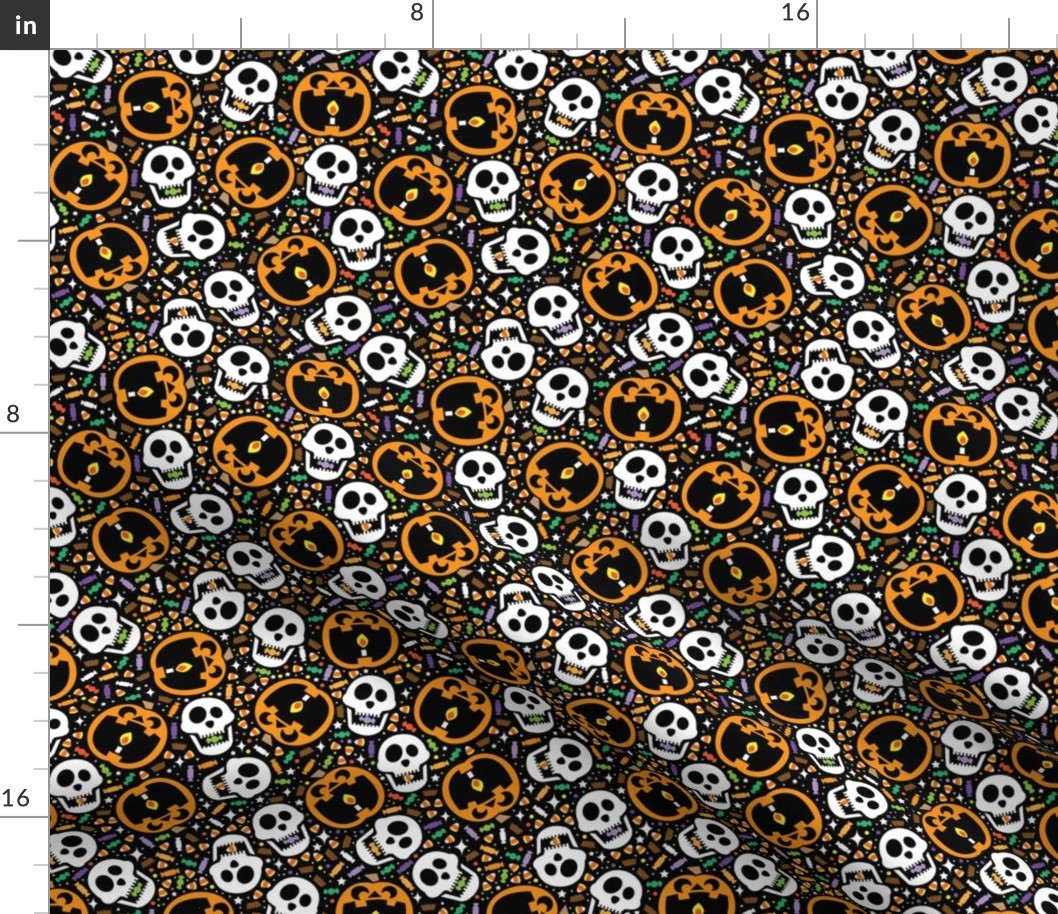 jackolantern and skulls on black