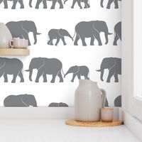 elephants march - dark grey on white