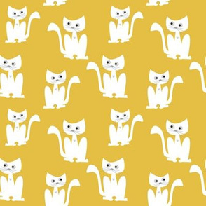 Cats on yellow