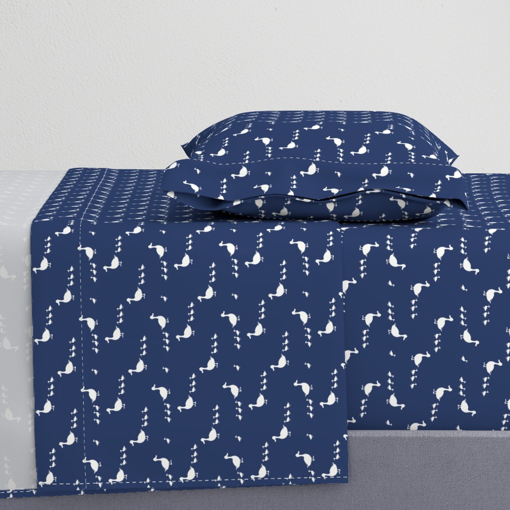 Ducks on navy blue