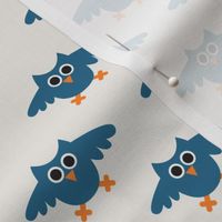 Flying owls in petrol blue