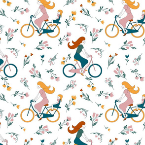 ladies on bikes and wild flowers