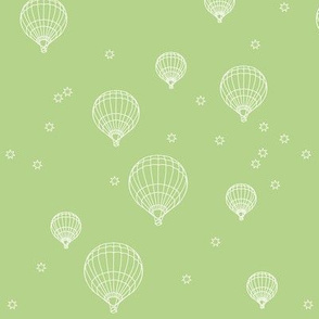 balloons and stars on green