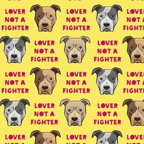 (1.5" scale) lover not a fighter - pit bull on yellow (raspberry text) C18BS