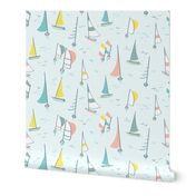 Sail boats on a summer day, blue, yellow, coral