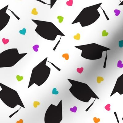 Tossed Graduation Caps with Rainbow Heart Confetti