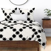 Star Trails Graphic Quilt: Black & Cream Cheater Quilt