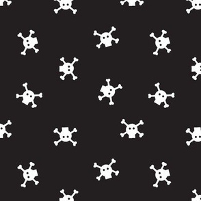 1” Bitty Skulls - White on black