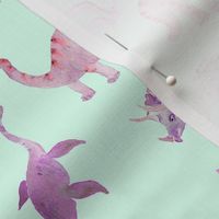 dinosaurs in pink on turquoise