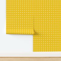 white polka dots on yellow 