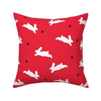 large bunnies on red for A