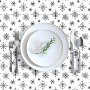 Elegant black snowflakes on white, holiday