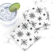 Elegant black snowflakes on white, holiday