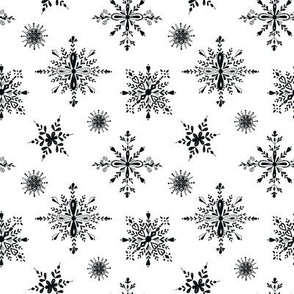 Elegant black snowflakes on white, holiday