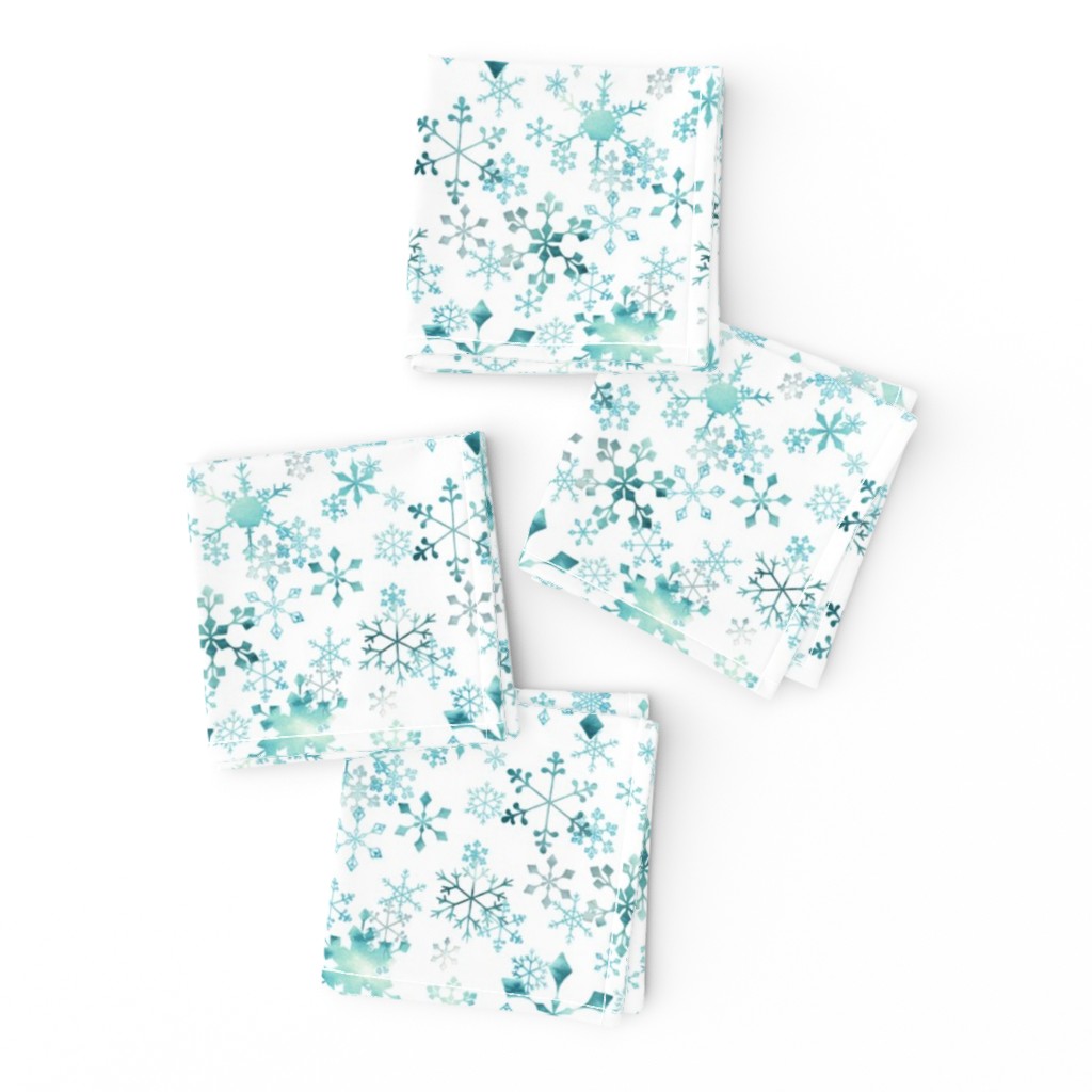 Snowflake crystals on white small