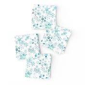 Snowflake crystals on white small