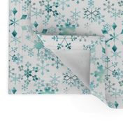 Snowflake crystals on white small