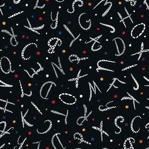 Hand-drawn alphabet letters with dots on black