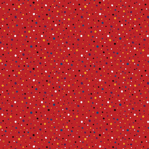 Multicolored dots on red background