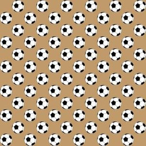 Half Inch Black and White Soccer Balls on Camel Brown