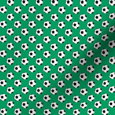 Half Inch Black and White Soccer Balls on Shamrock Green