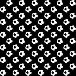 Half Inch Black and White Soccer Balls on Black