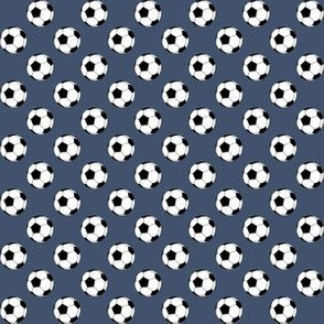 Half Inch Black and White Soccer Balls on Blue Jeans Blue